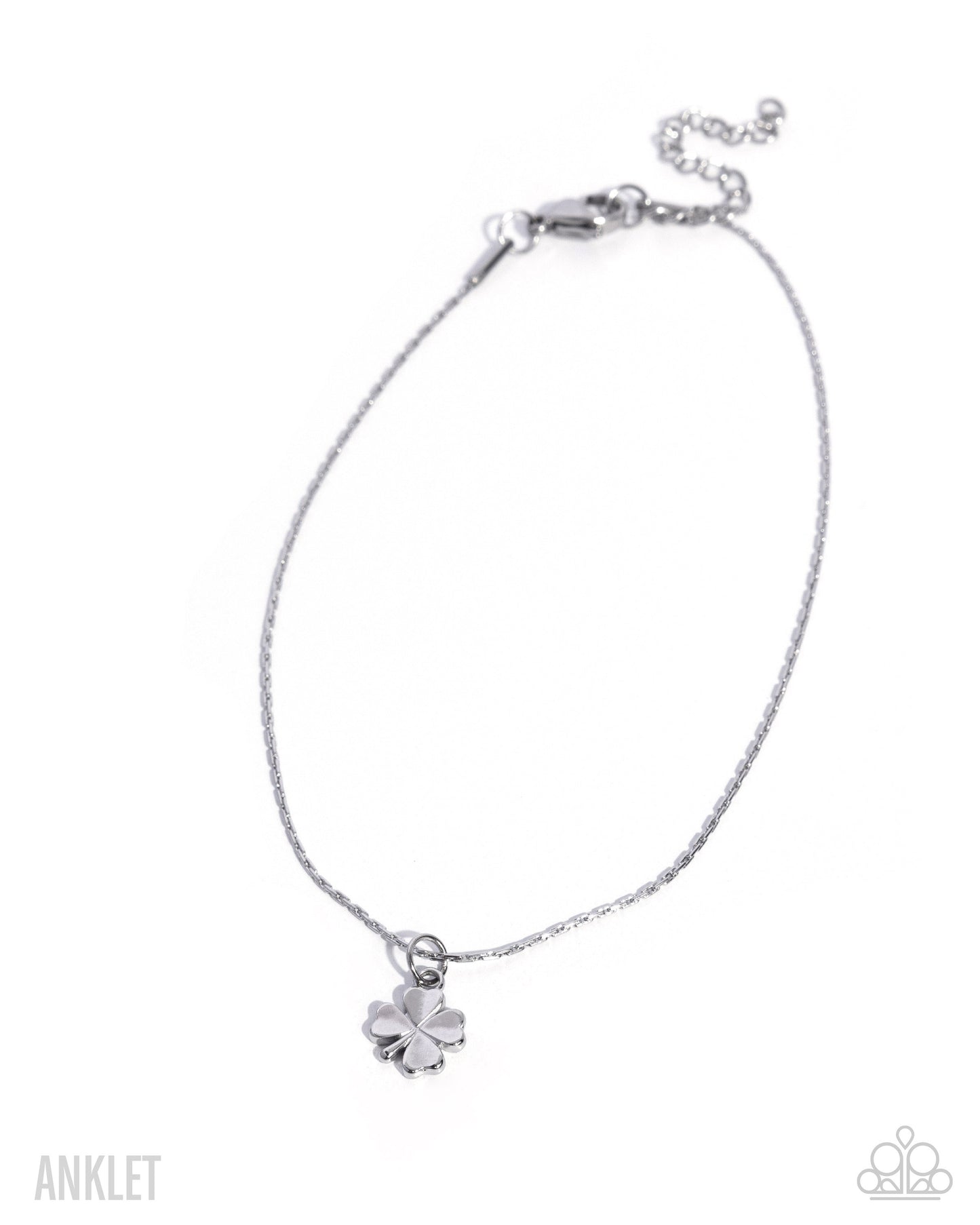 Silver anklet with a clover charm on a white background