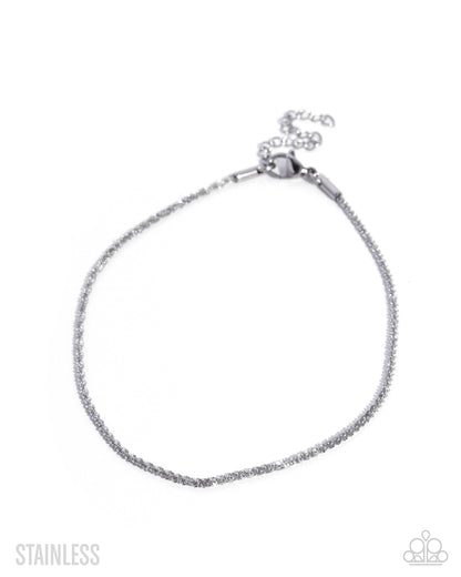 Silver bracelet on a white background