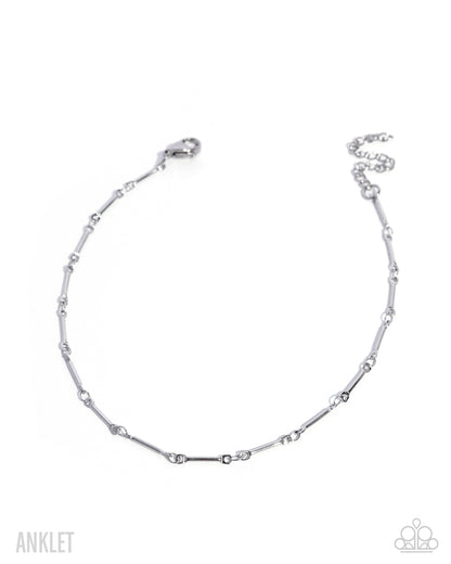 A silver-toned beaded anklet with a lobster clasp and extender chain, displayed on a clean white background with brand watermarks.