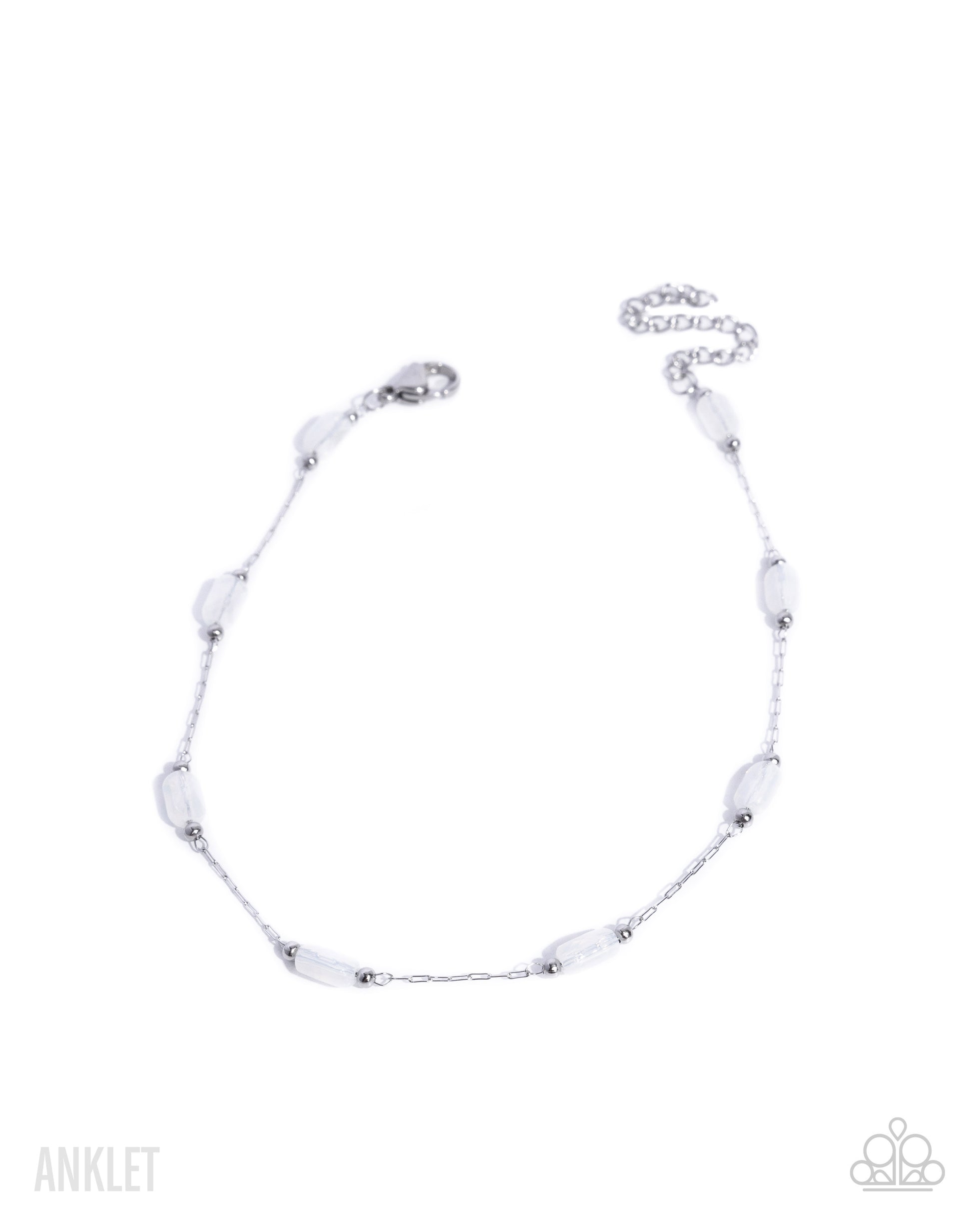 Silver anklet with white beads on a white background