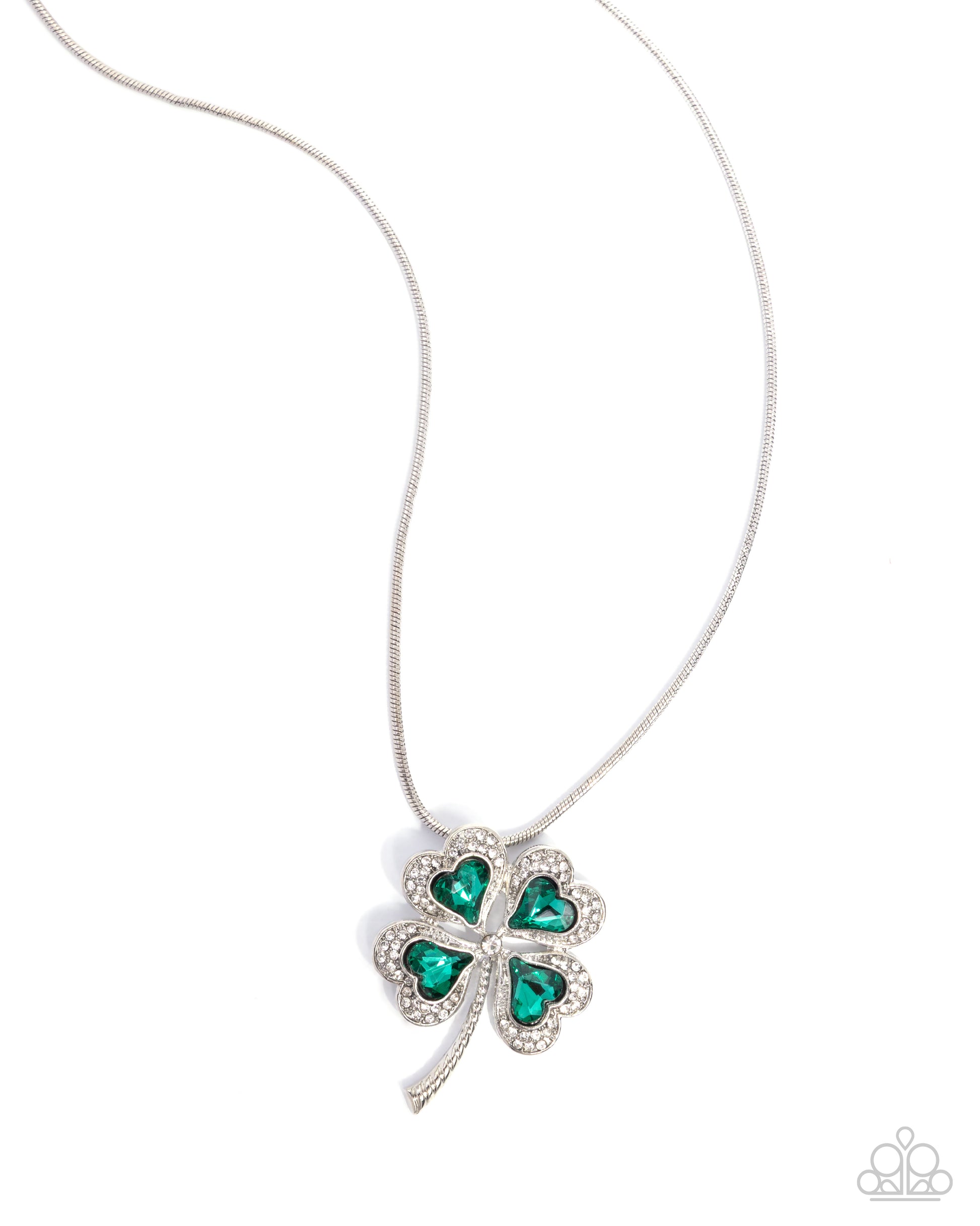 Four-leaf clover pendant necklace with green gemstones on a white background