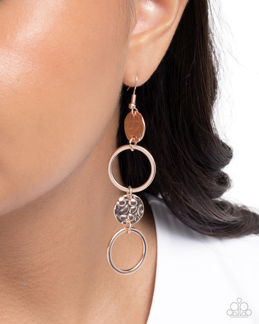 Earring worn by a model with a white background