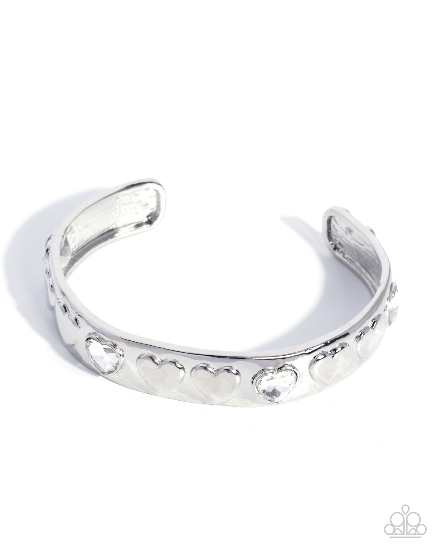 Silver bracelet with heart and circle designs on a white background