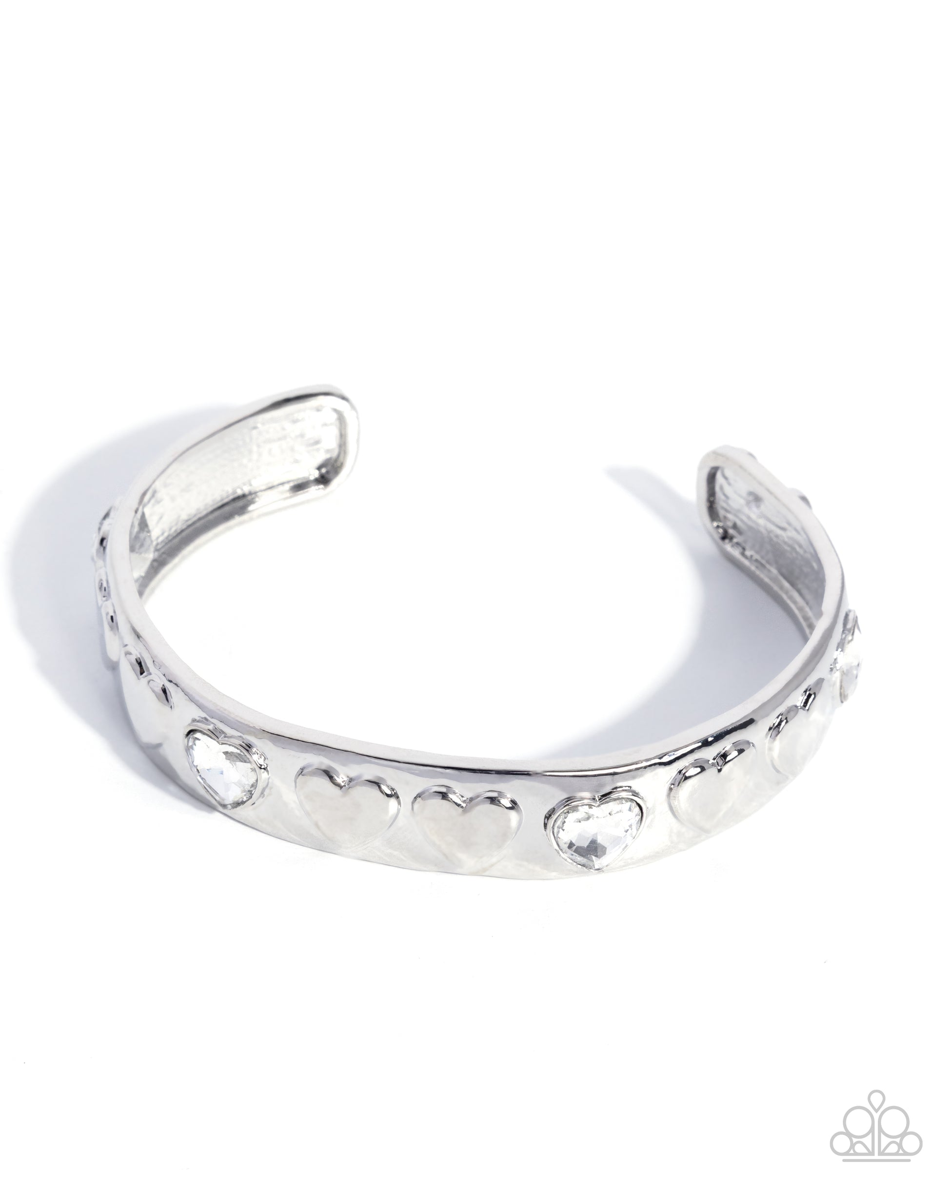 Silver bracelet with heart and circle designs on a white background