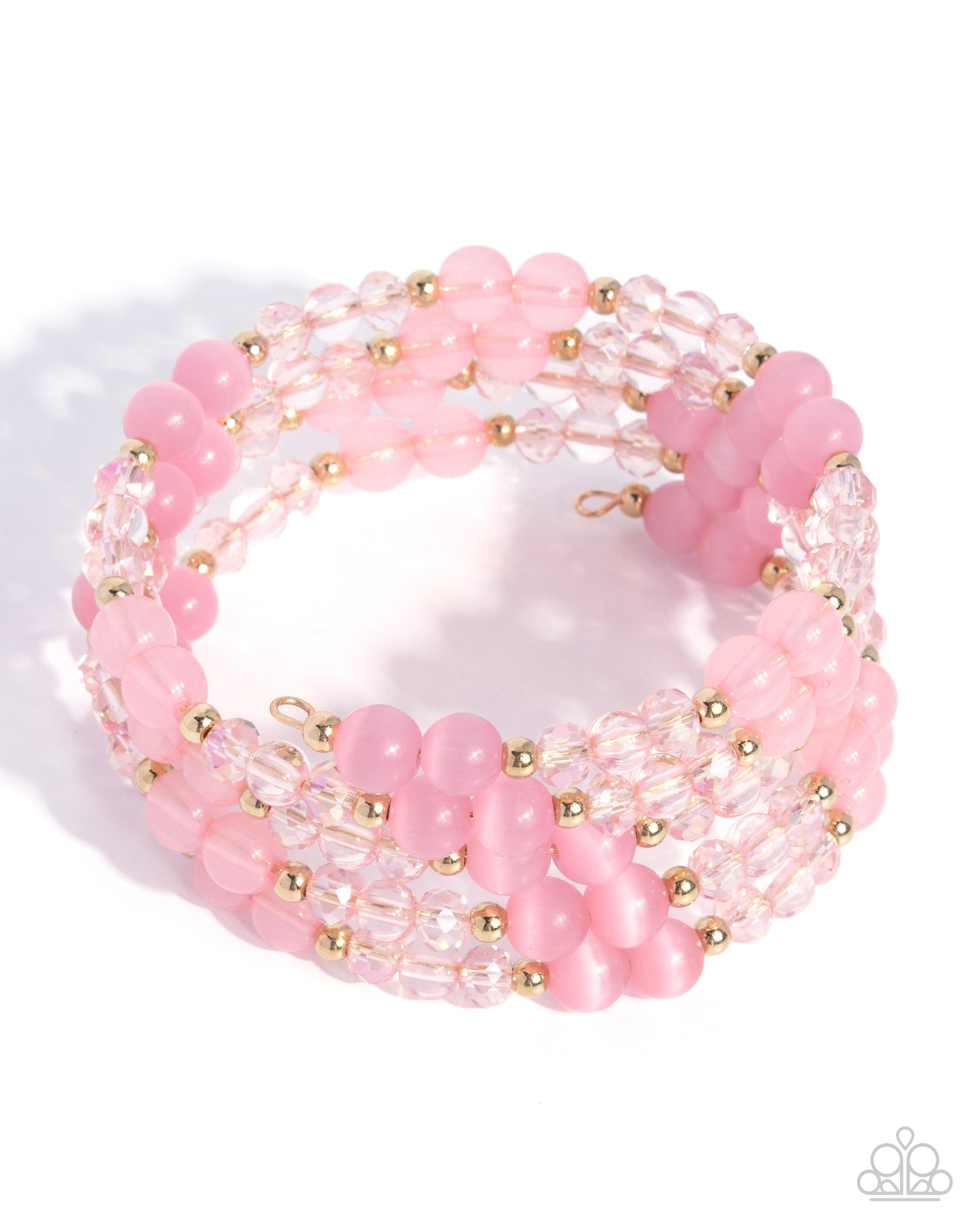 Pink beaded bracelet with gold accents on a white background