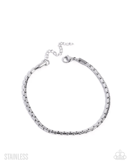 Silver bracelet on a white background with 'Stainless' text.