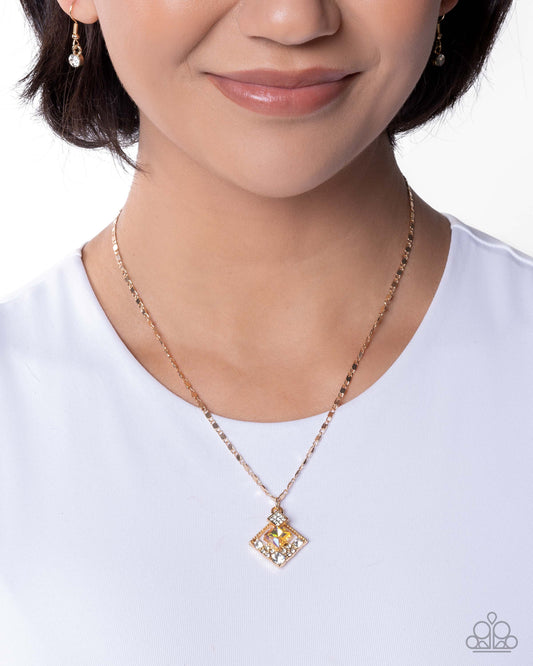 Person wearing a gold necklace with a square pendant on a white background