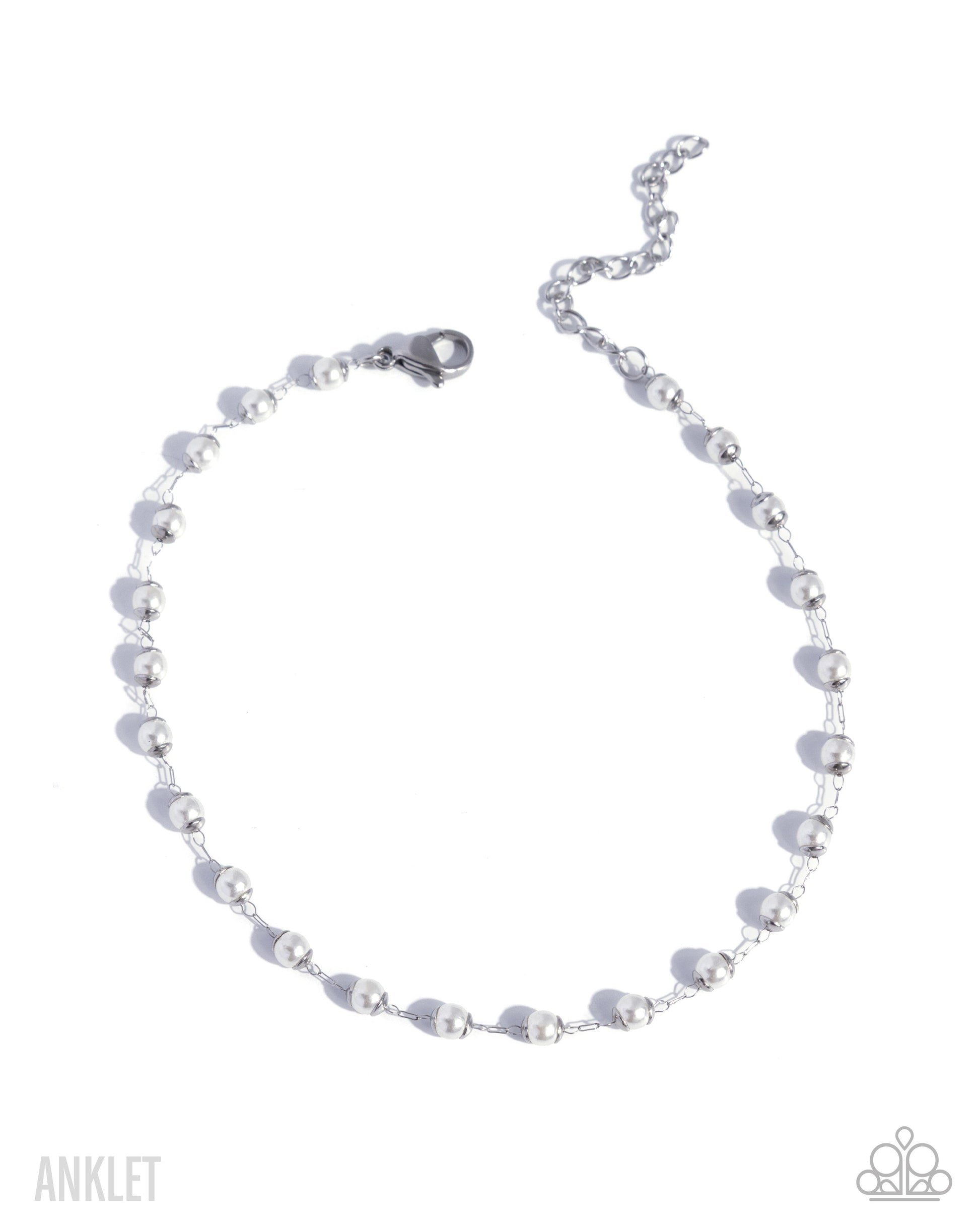 Silver beaded anklet on a white background