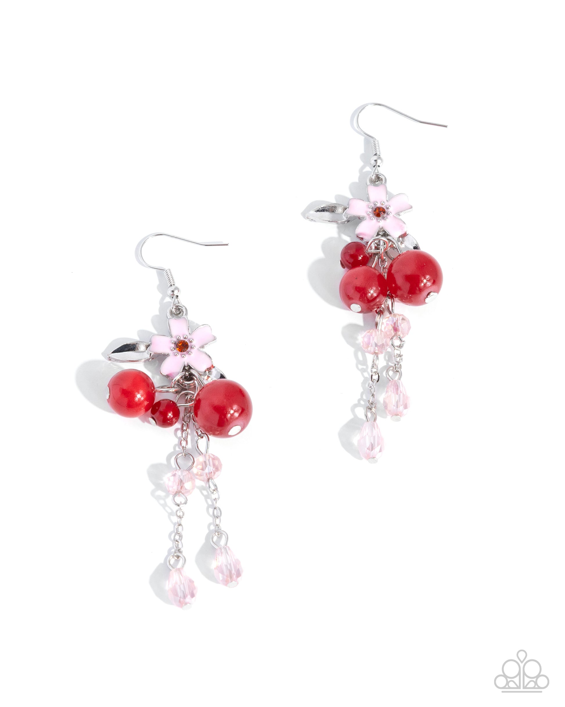 Pair of earrings with red beads and pink flowers on a white background
