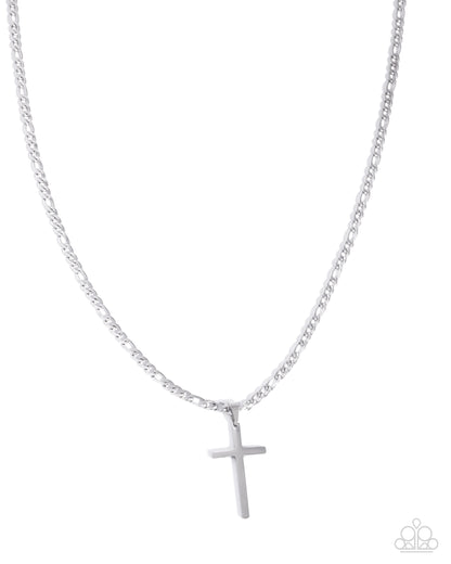 Silver cross necklace on a white background