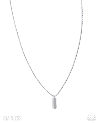 Silver necklace with a rectangular pendant on a white background