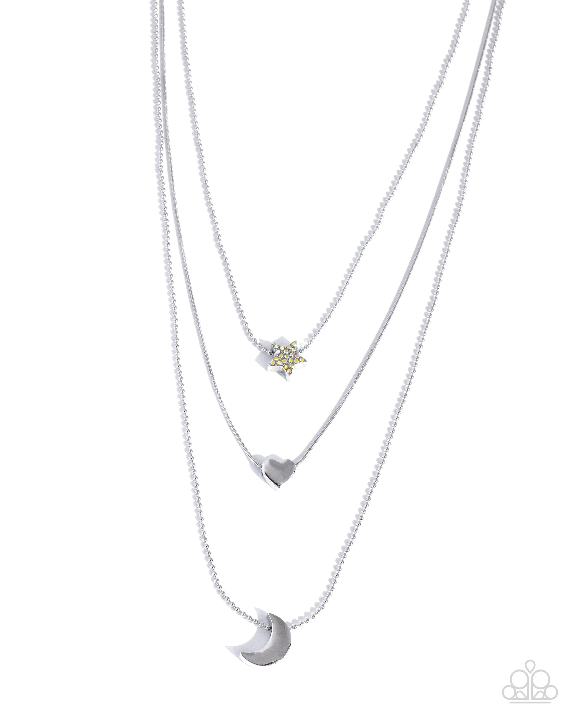 Layered necklaces with heart, star, and moon pendants on a white background