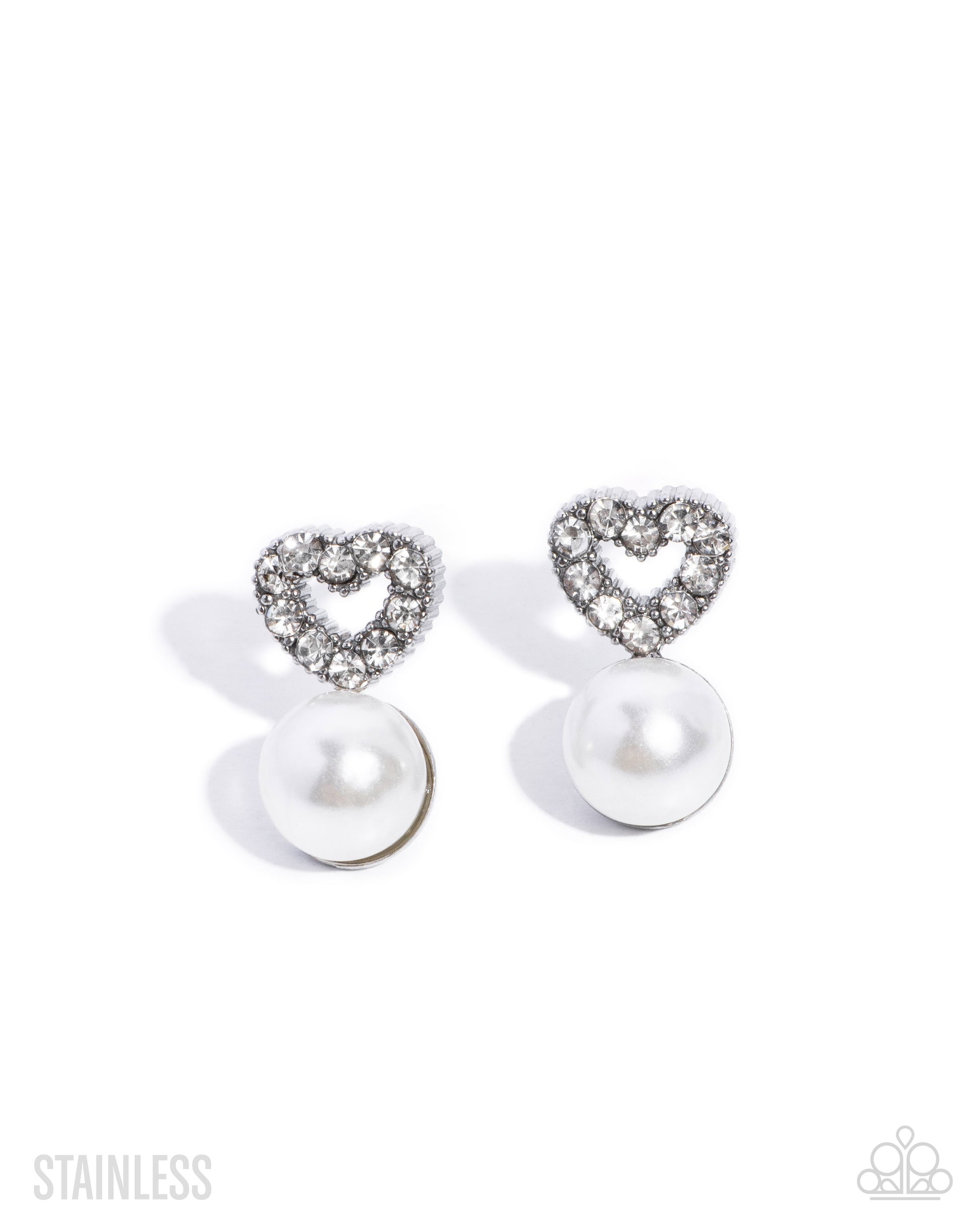 A pair of heart-shaped stud earrings featuring a silver-tone stainless steel heart pavé set with clear stones and a dangling white pearl drop, shown on a white background with a 'STAINLESS' text overlay.