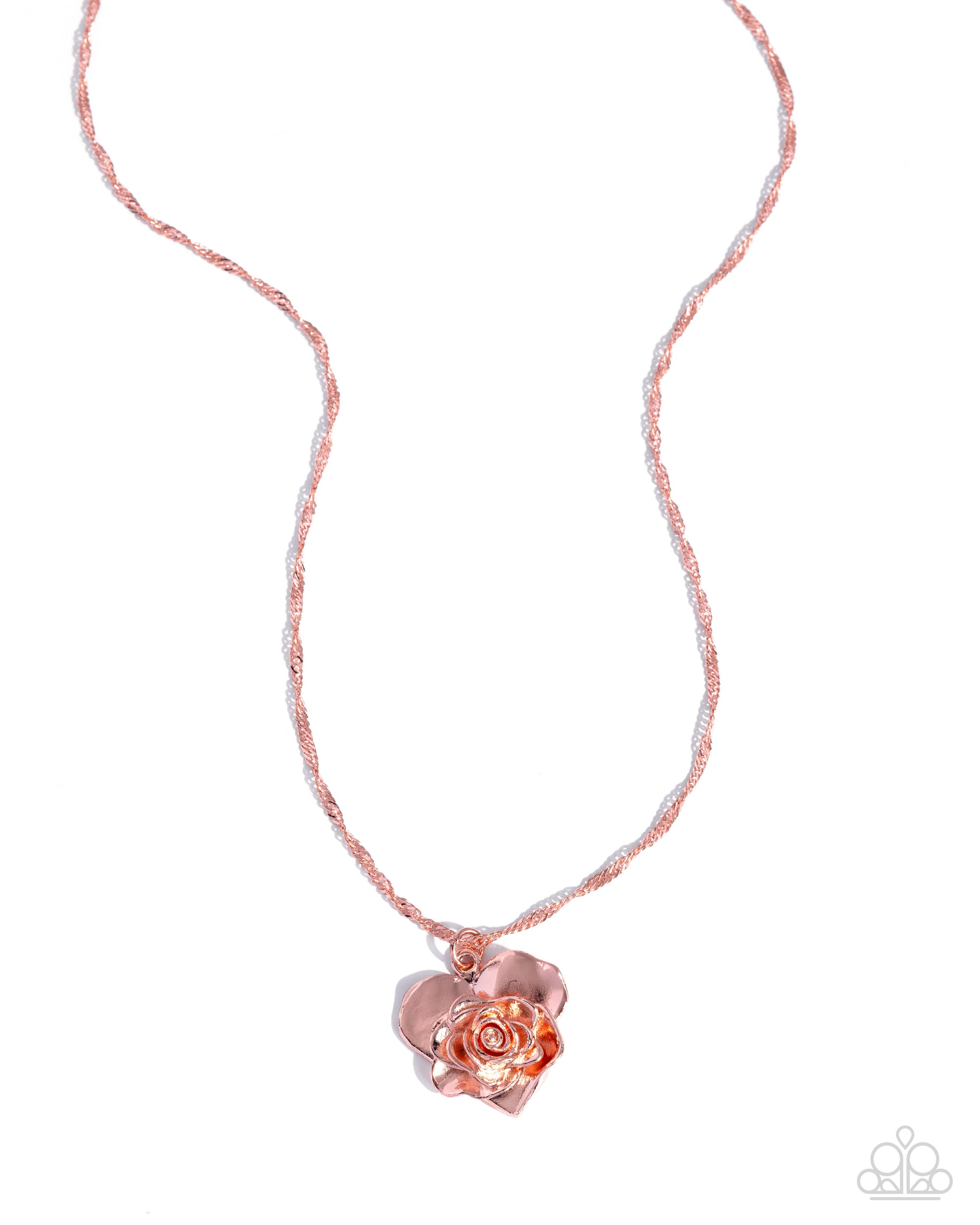 Rose gold heart-shaped pendant on a thin chain against a white background