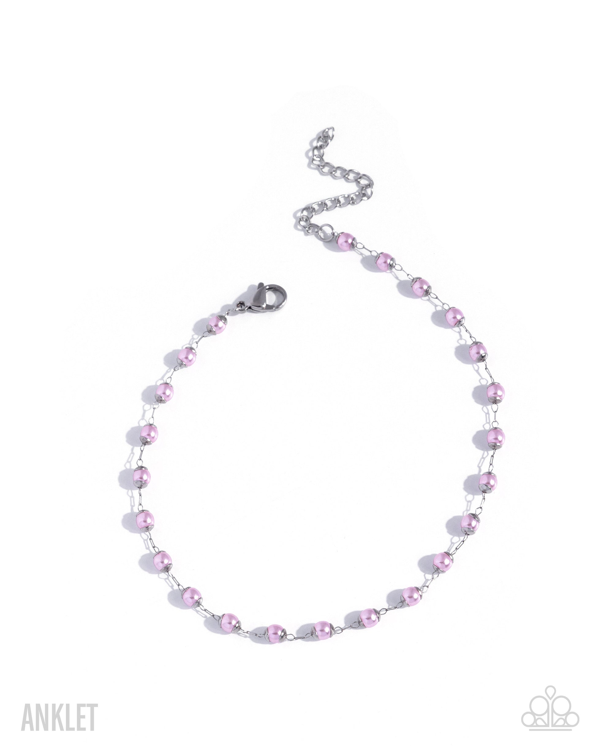 Pink beaded anklet on a white background