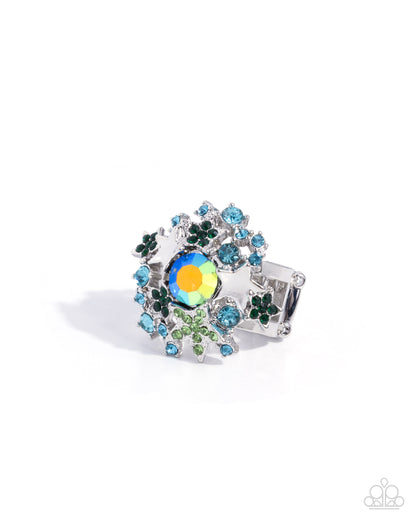 Decorative ring with colorful gemstones on a white background