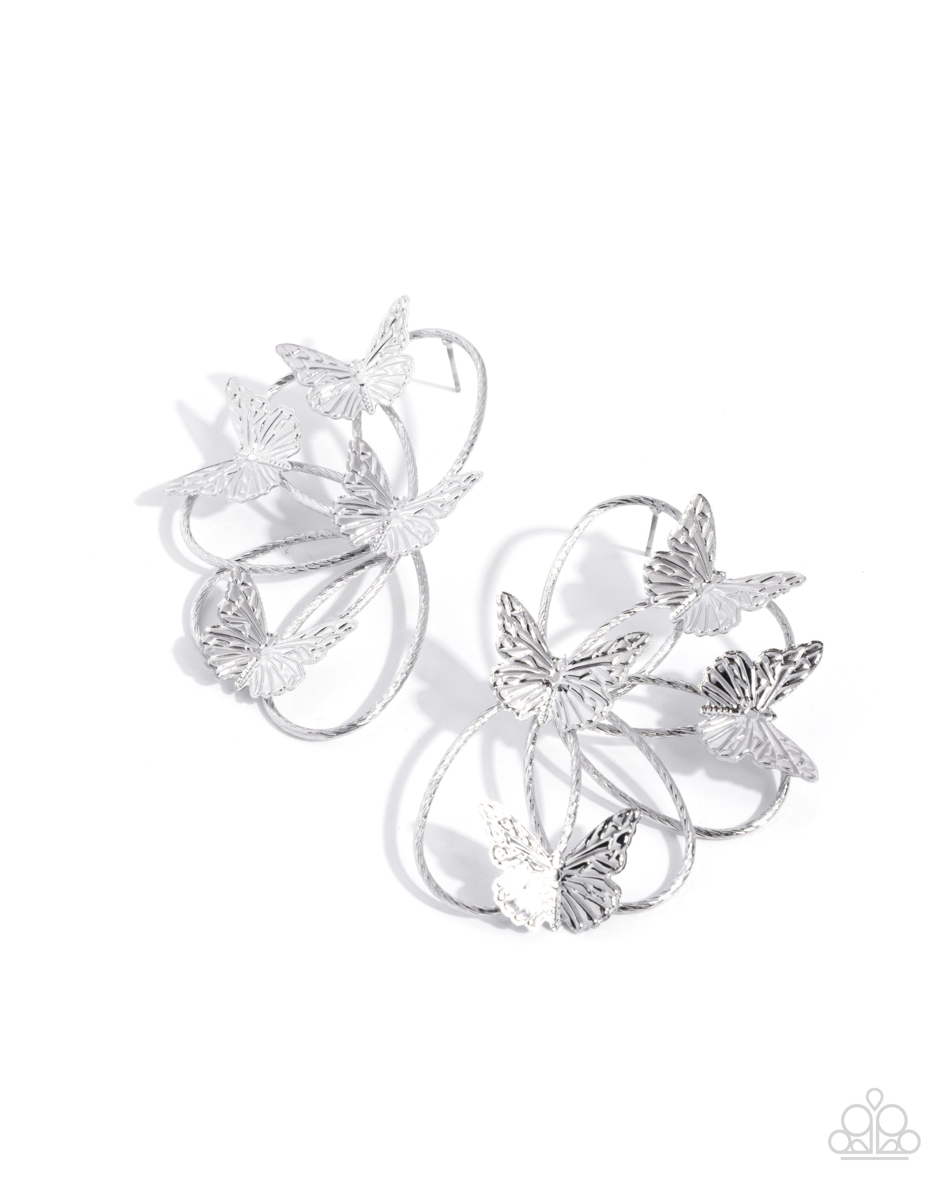 Silver butterfly earrings on a white background
