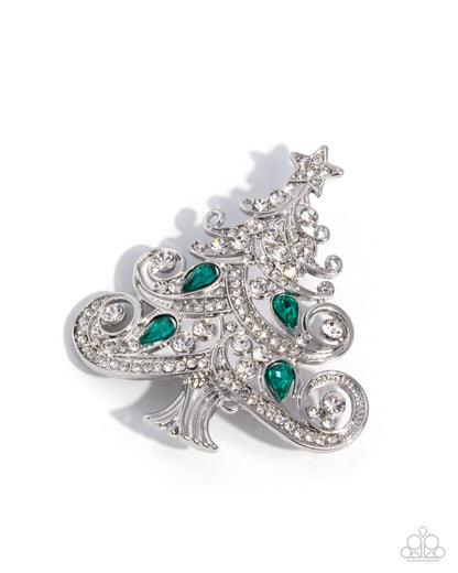 Silver brooch with green gemstones on a white background