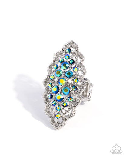 Silver hair clip with multicolored gemstones on a white background