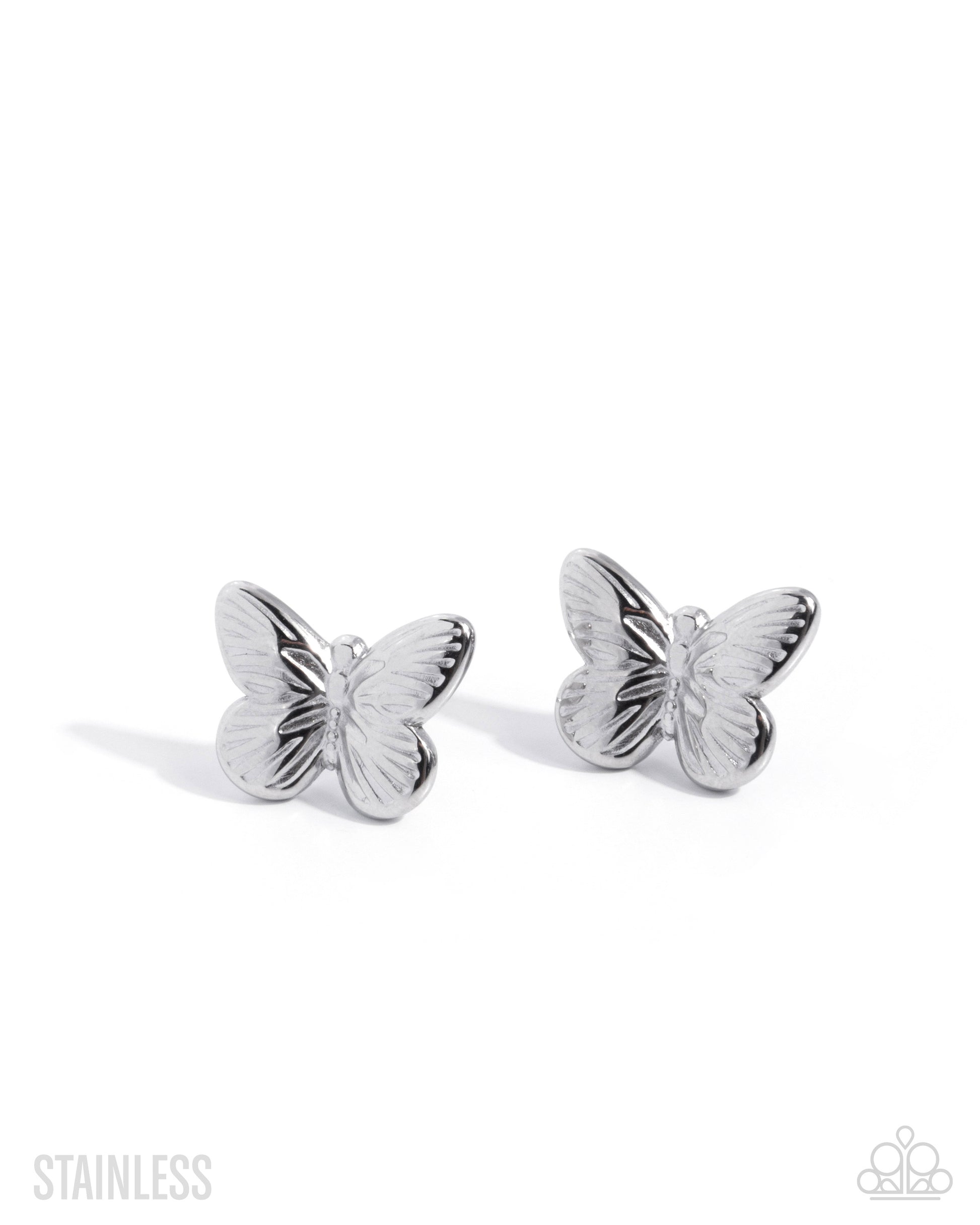 Silver butterfly earrings on a white background