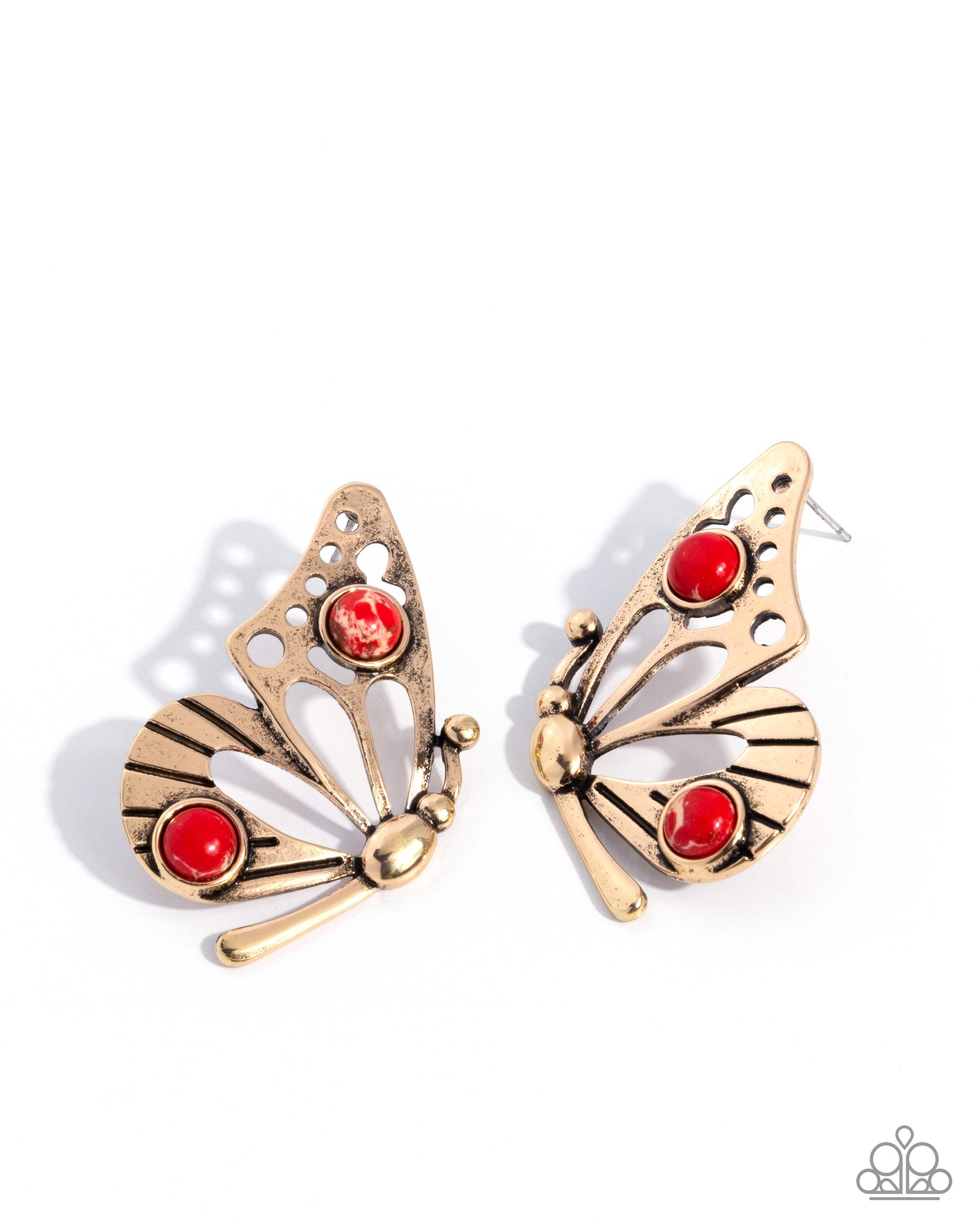 Butterfly-shaped earrings with gold and red accents on a white background
