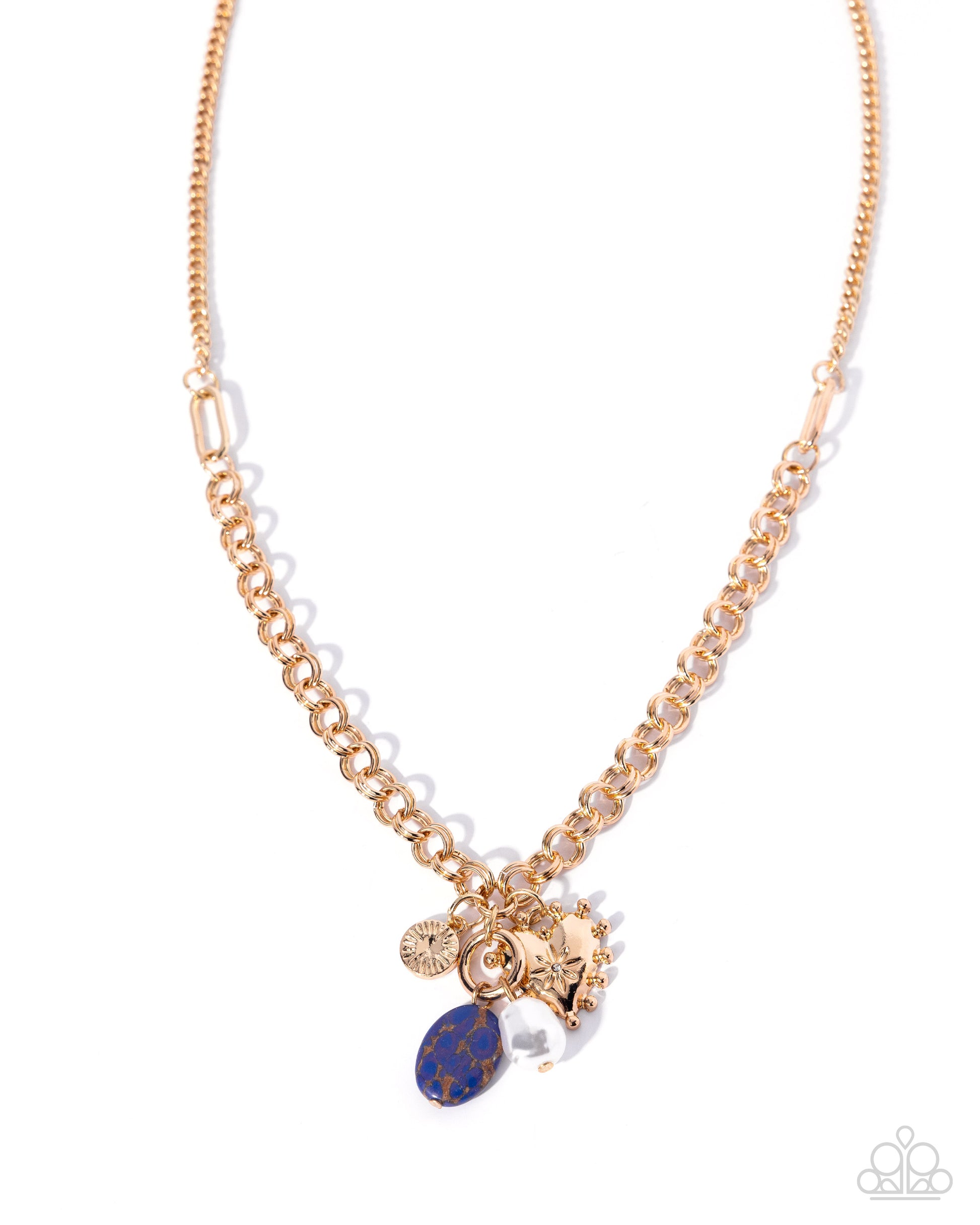 Gold necklace with blue pendant on a white background