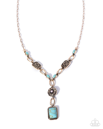 Necklace with turquoise pendant and floral charm on a white background
