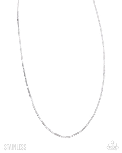 Silver chain necklace on a white background