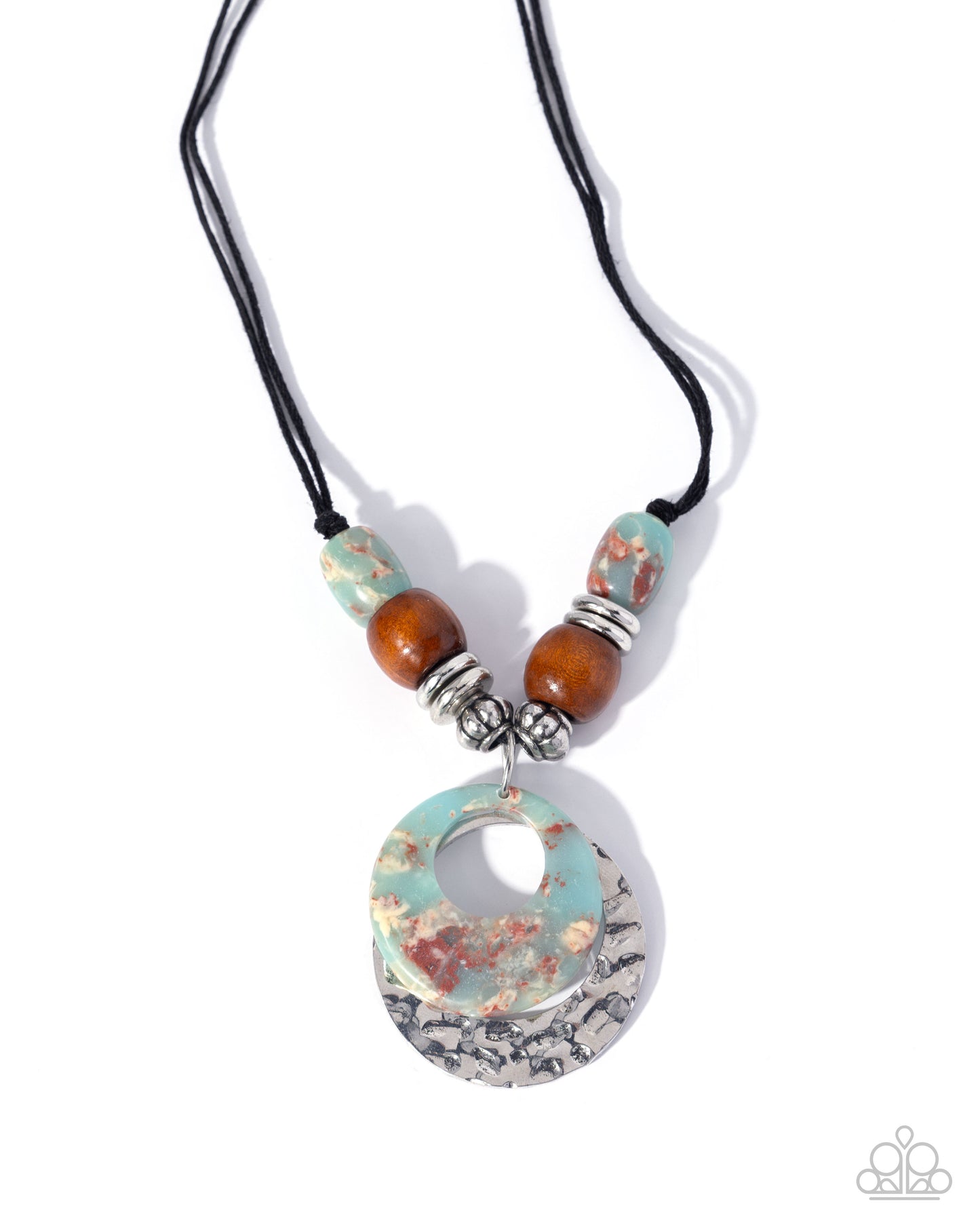 A bohemian-style necklace featuring a large circular stone pendant with turquoise, brown, and silver marbled patterns, suspended on a black cord with matching accent beads and silver spacer rings.