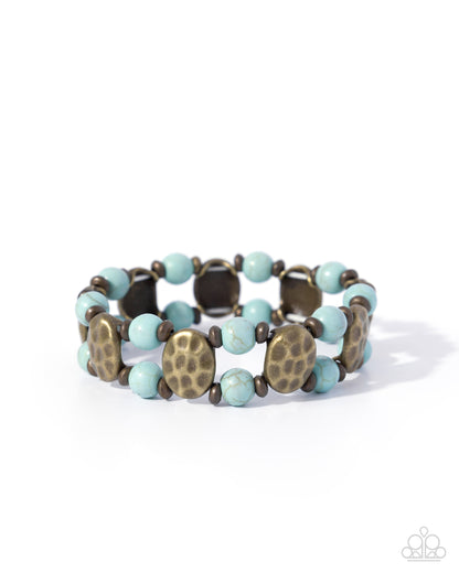 Turquoise and bronze beaded bracelet on a white background