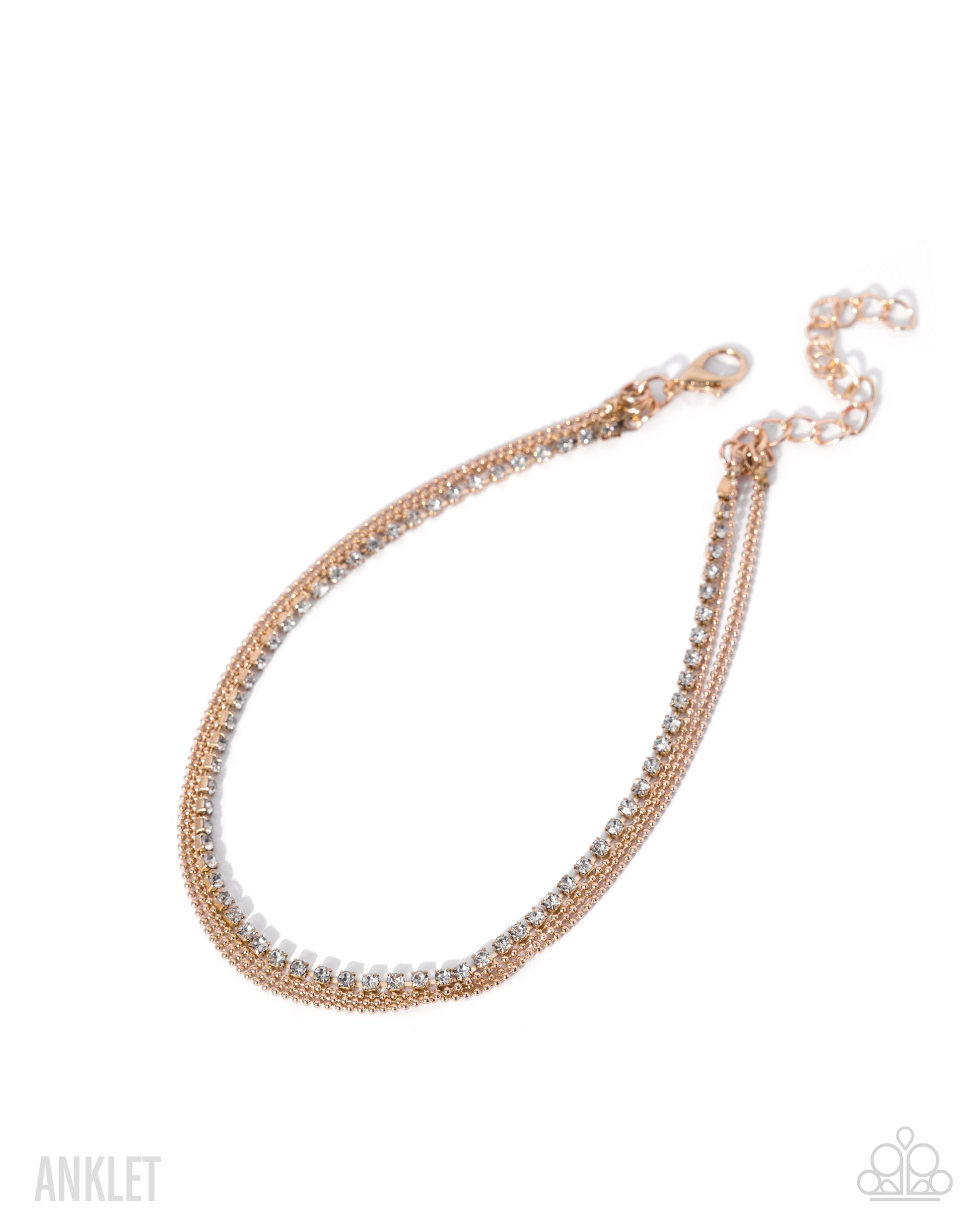 Rose gold anklet with clear stones on a white background
