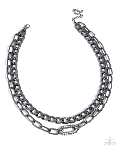 Double-layered chain necklace on a white background