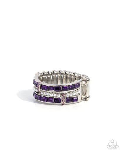Silver ring with purple gemstones on a white background