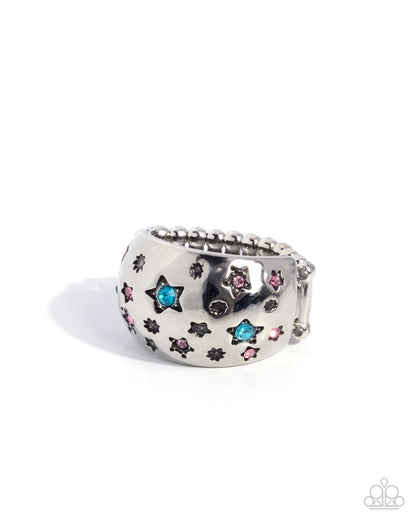 Silver ring with star-shaped gemstones on a white background