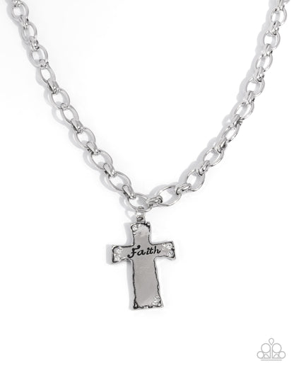 Silver necklace with a cross pendant on a white background