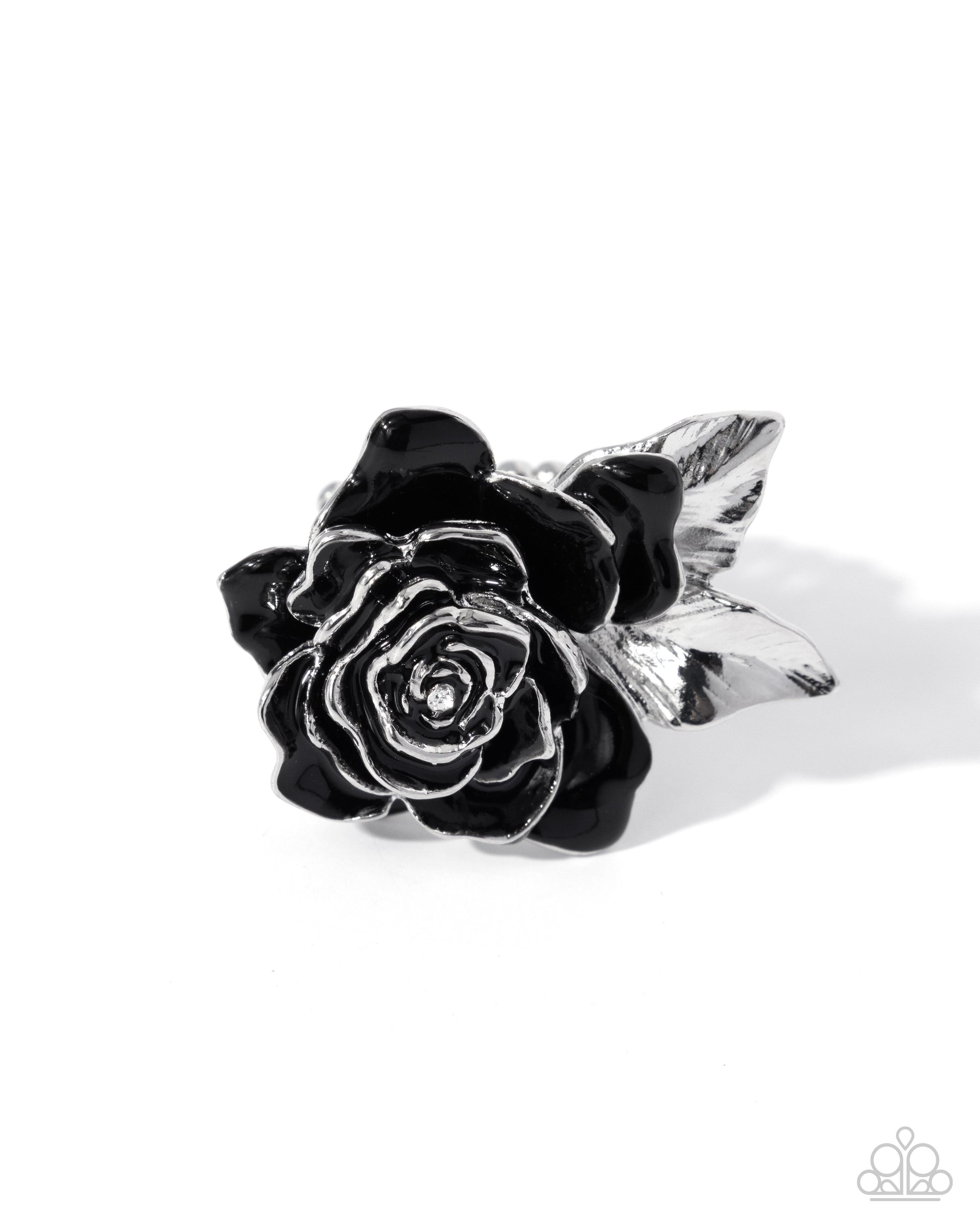 Silver ring with black rose design on a white background
