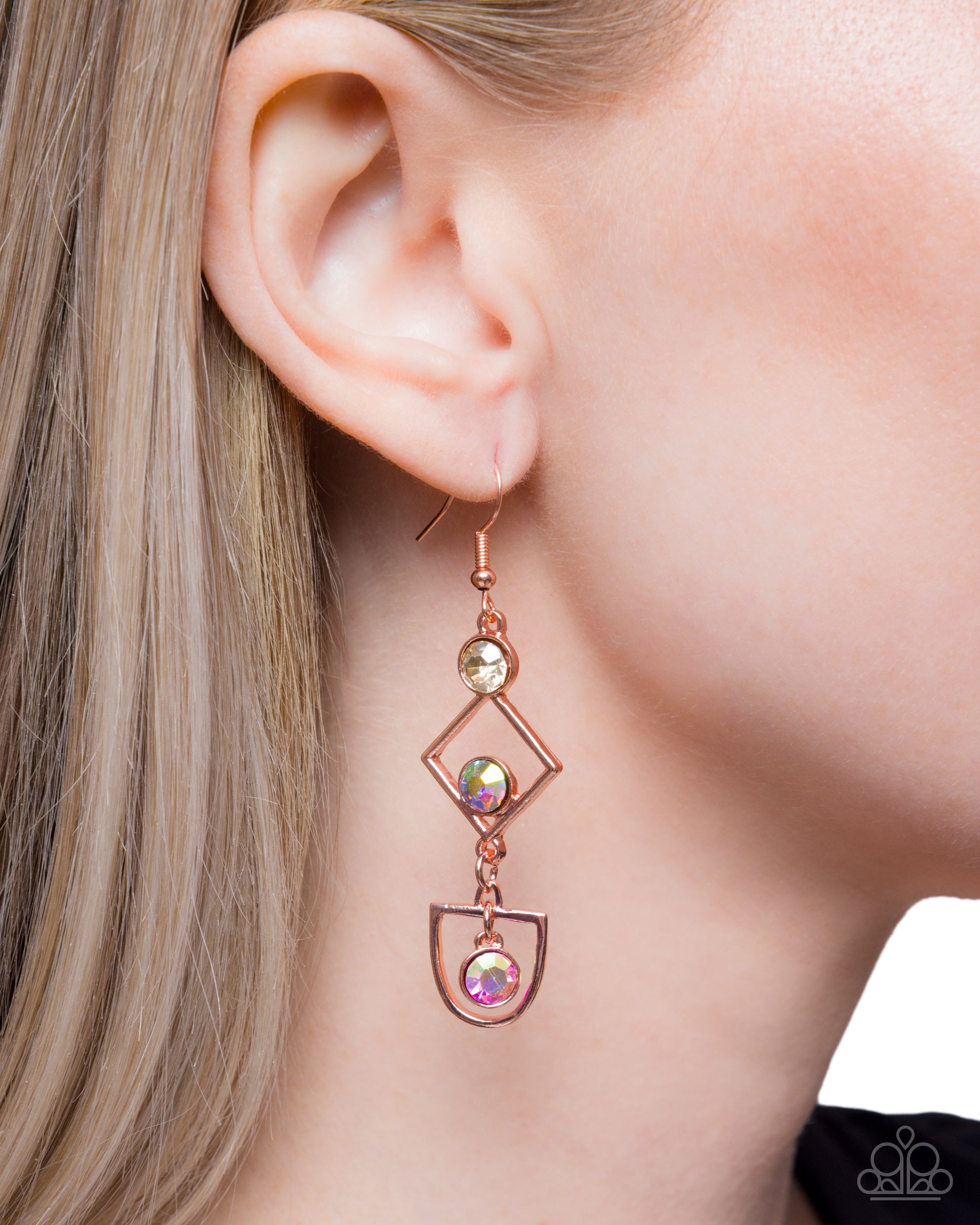 Rose gold earring with gemstones worn by a model