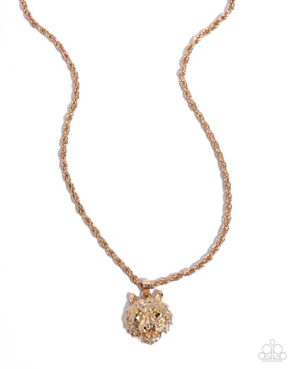 Rose gold necklace with a lion head pendant on a white background