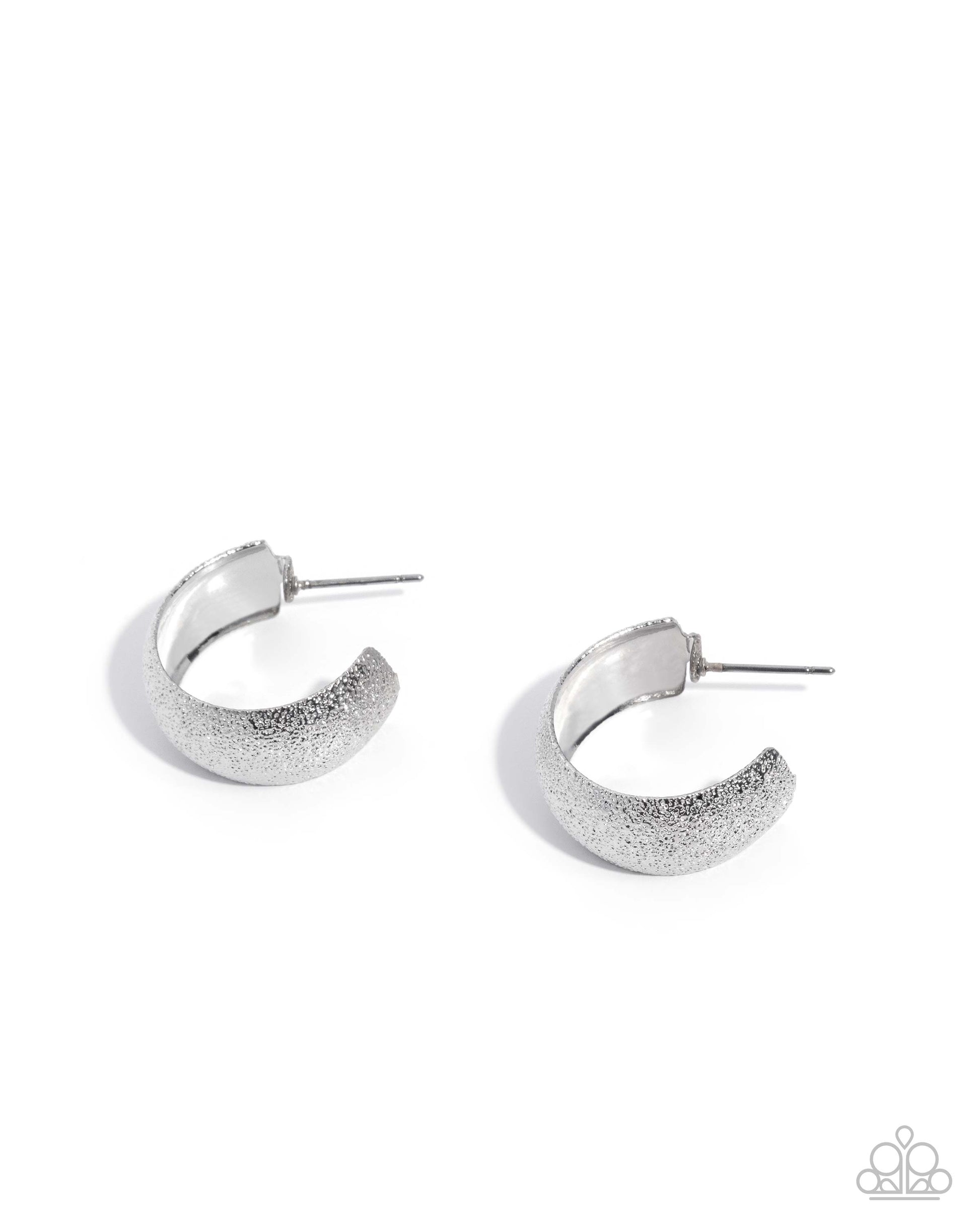 Silver hoop earrings on a white background