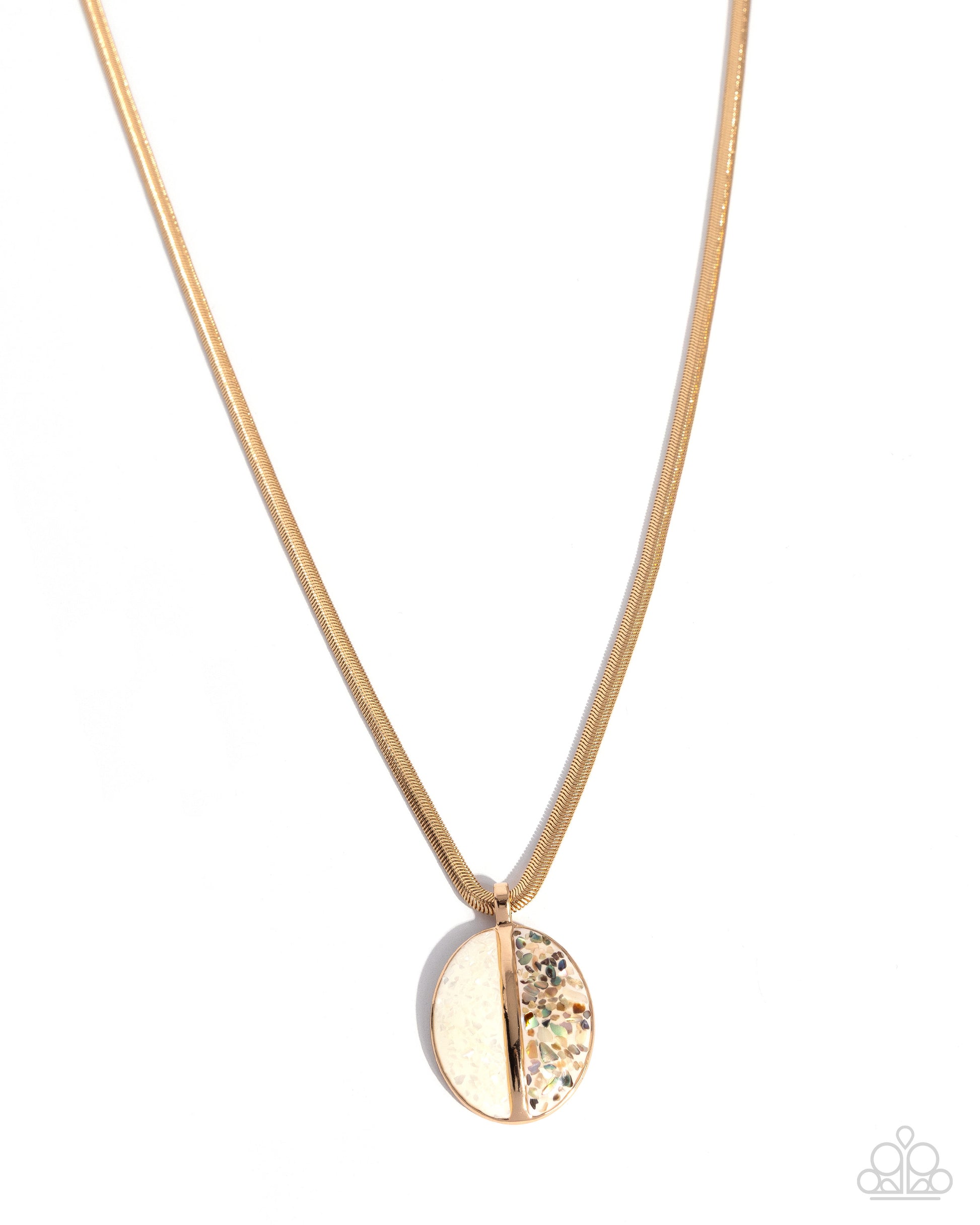 Gold necklace with a round, glittery pendant on a white background