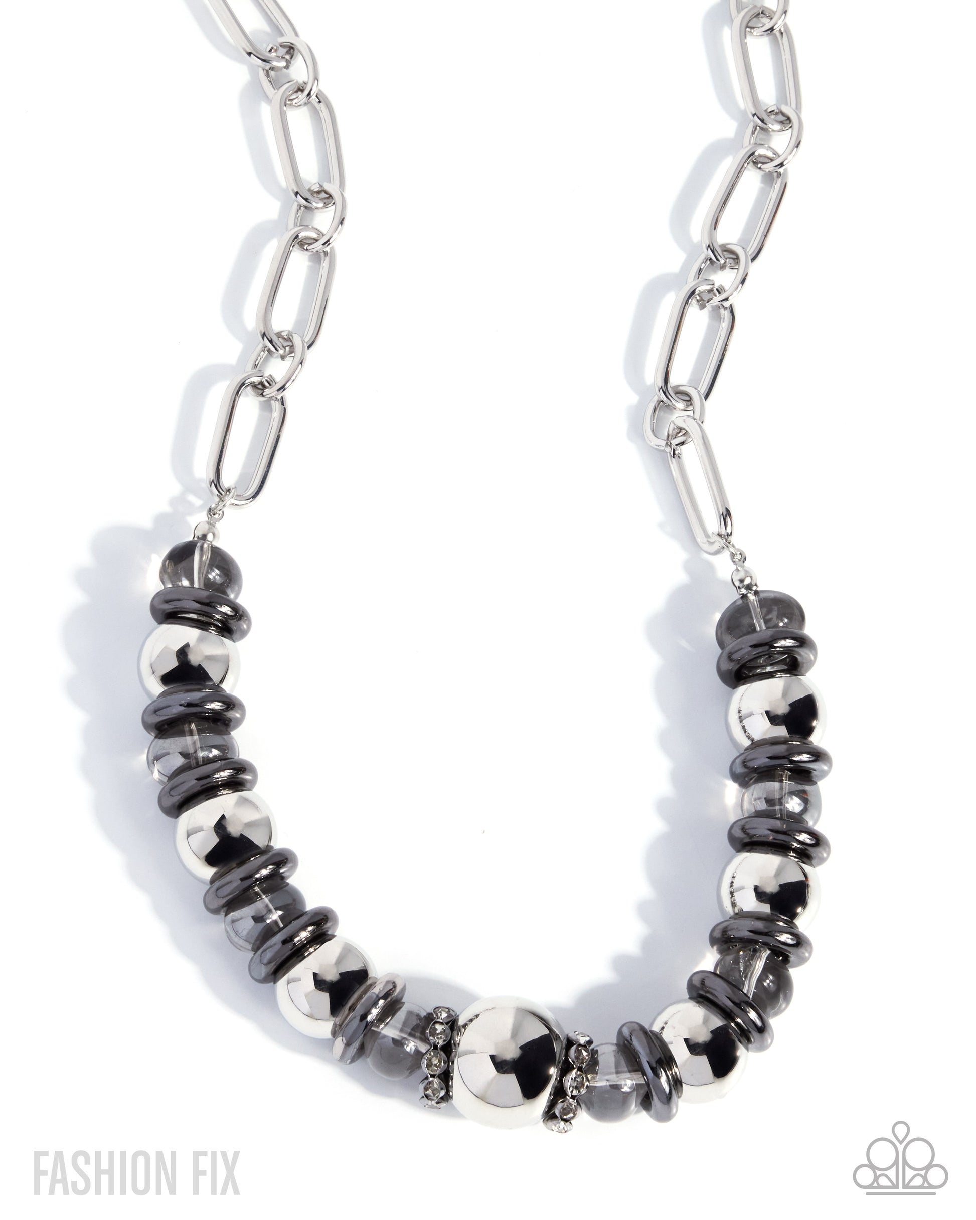 A silver paperclip chain necklace featuring a central beaded section with alternating polished silver and dark gray metallic beads, displayed on a clean white background.
