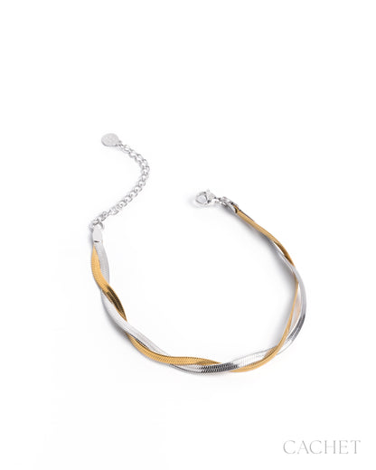 Two-tone gold and silver necklace on a white background with 'Cachet' branding.