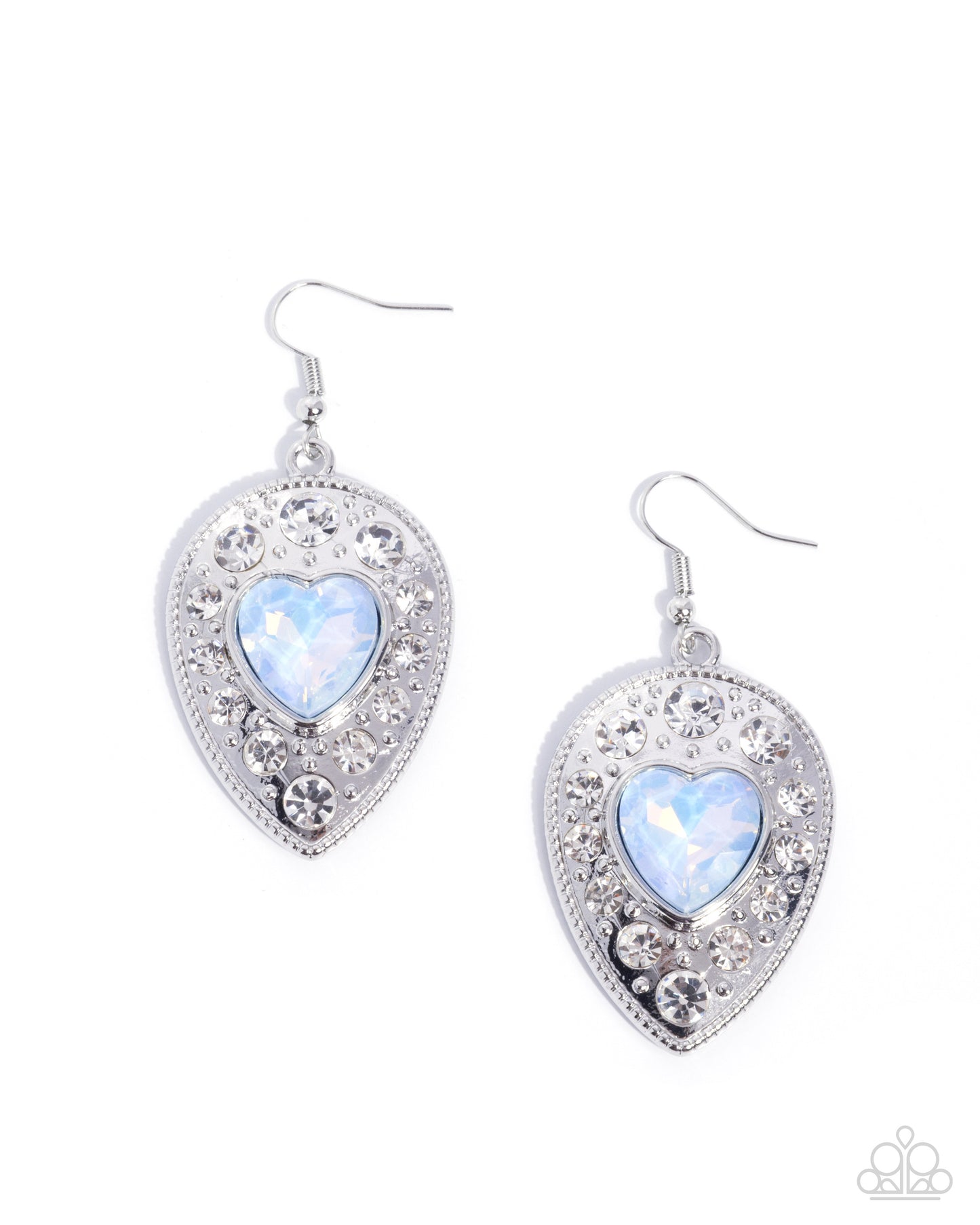 Pair of heart-shaped earrings with blue gemstones on a white background