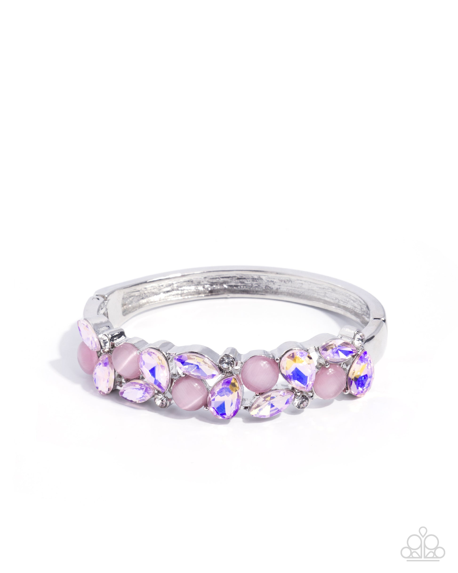 Silver ring with pink and purple gemstones on a white background
