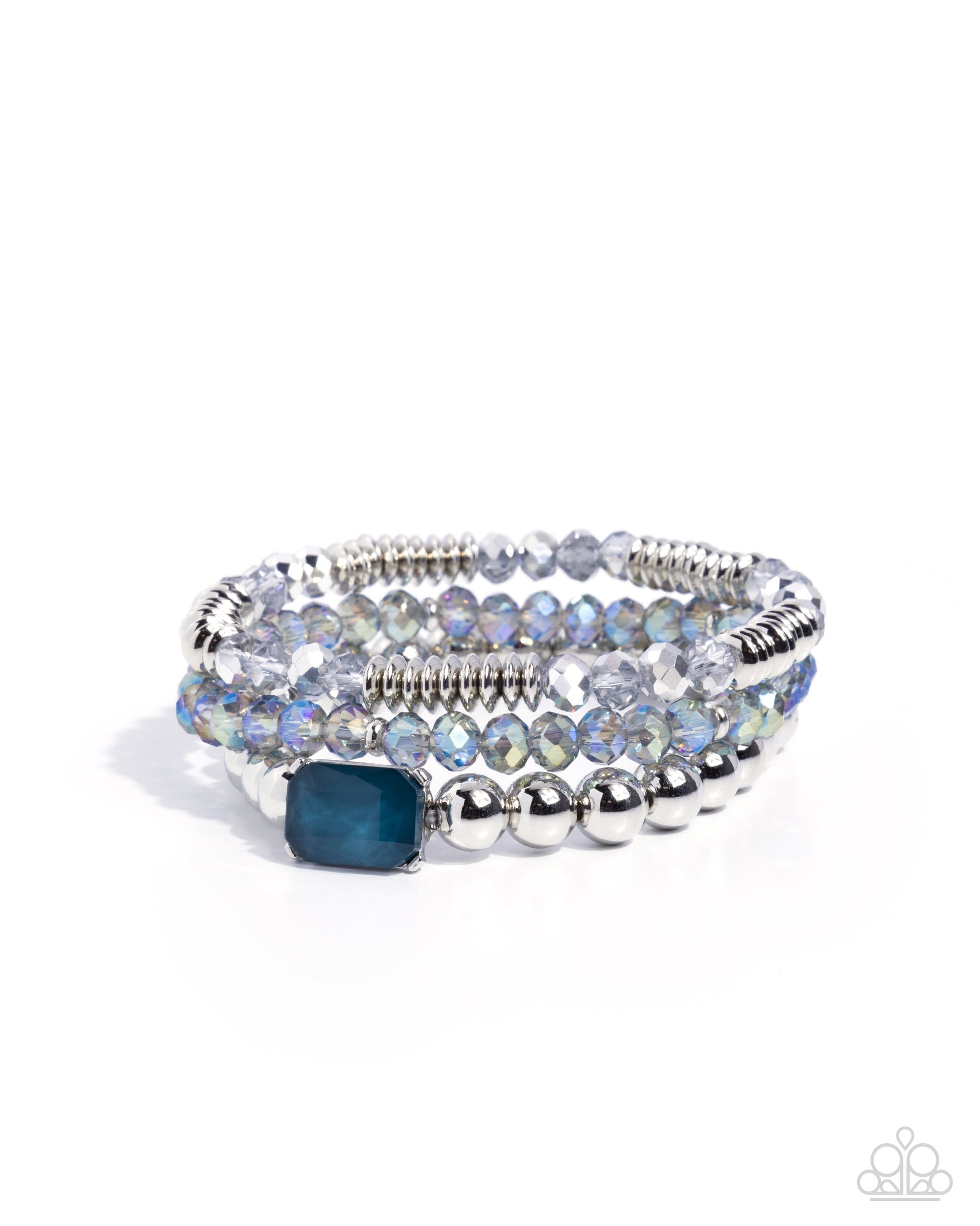 Stack of beaded bracelets with a blue accent stone on a white background