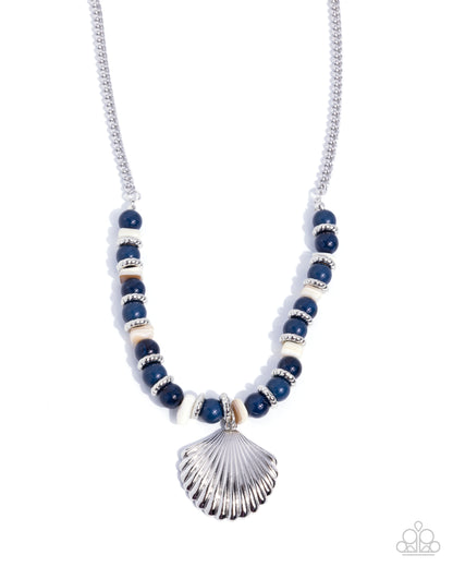 Necklace with blue beads and silver shell pendant on a white background