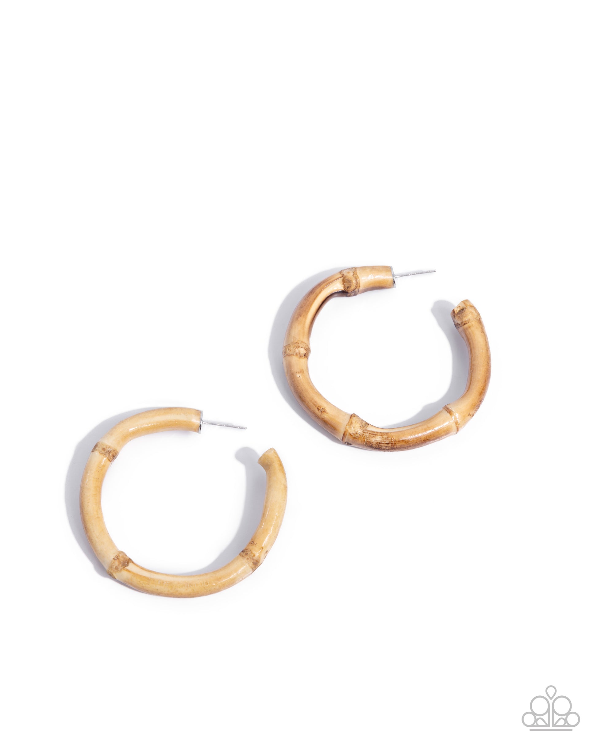 Gold hoop earrings on a white background