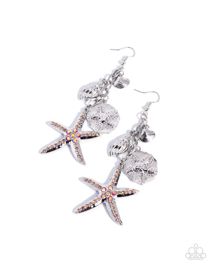 Starfish and shell earrings on a white background