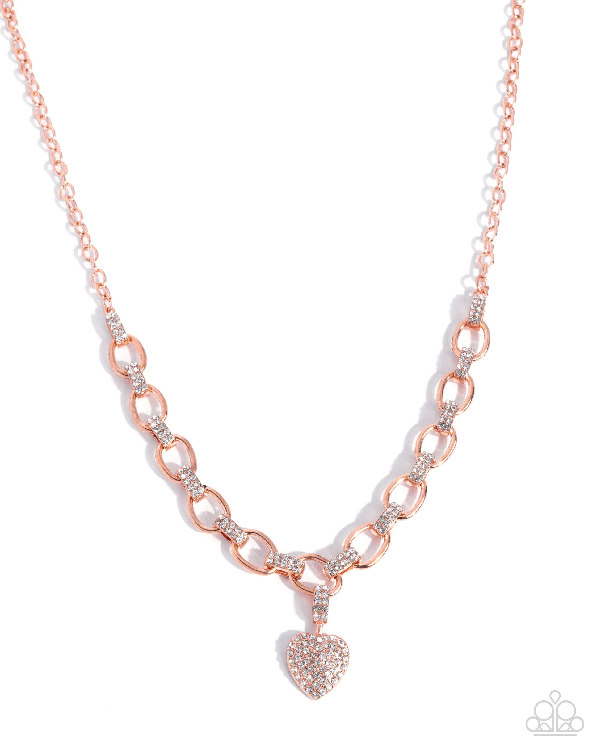 Rose gold chain necklace with a heart pendant on a white background
