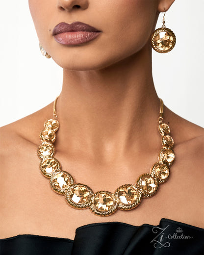 A close-up of a model wearing a gold statement necklace and matching drop earrings. The jewelry features textured, circular gold-toned discs connected by twisted rope-style links.